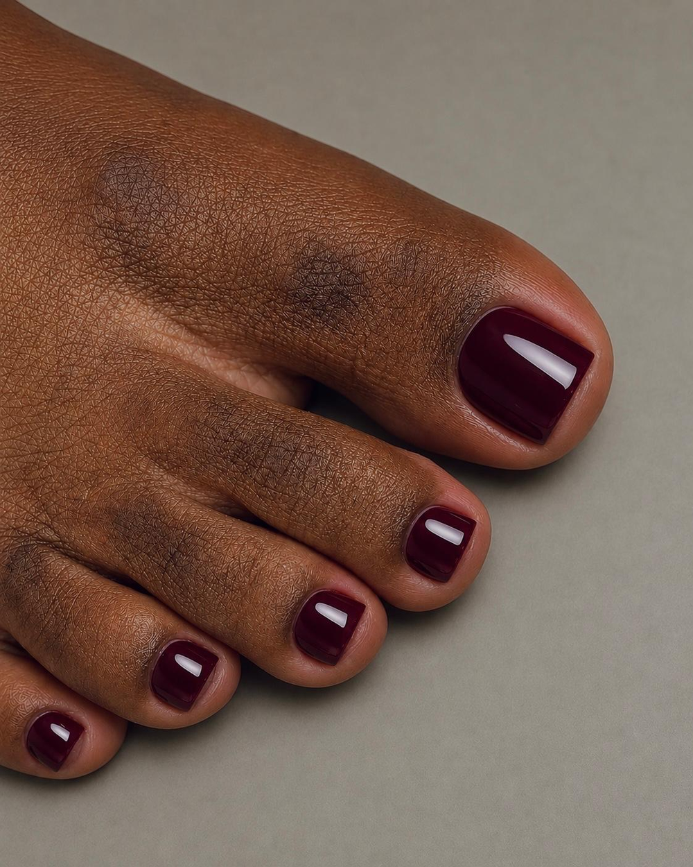 Burgundy pedicure