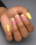 Yellow french tips on nude base mixed almond and square nails