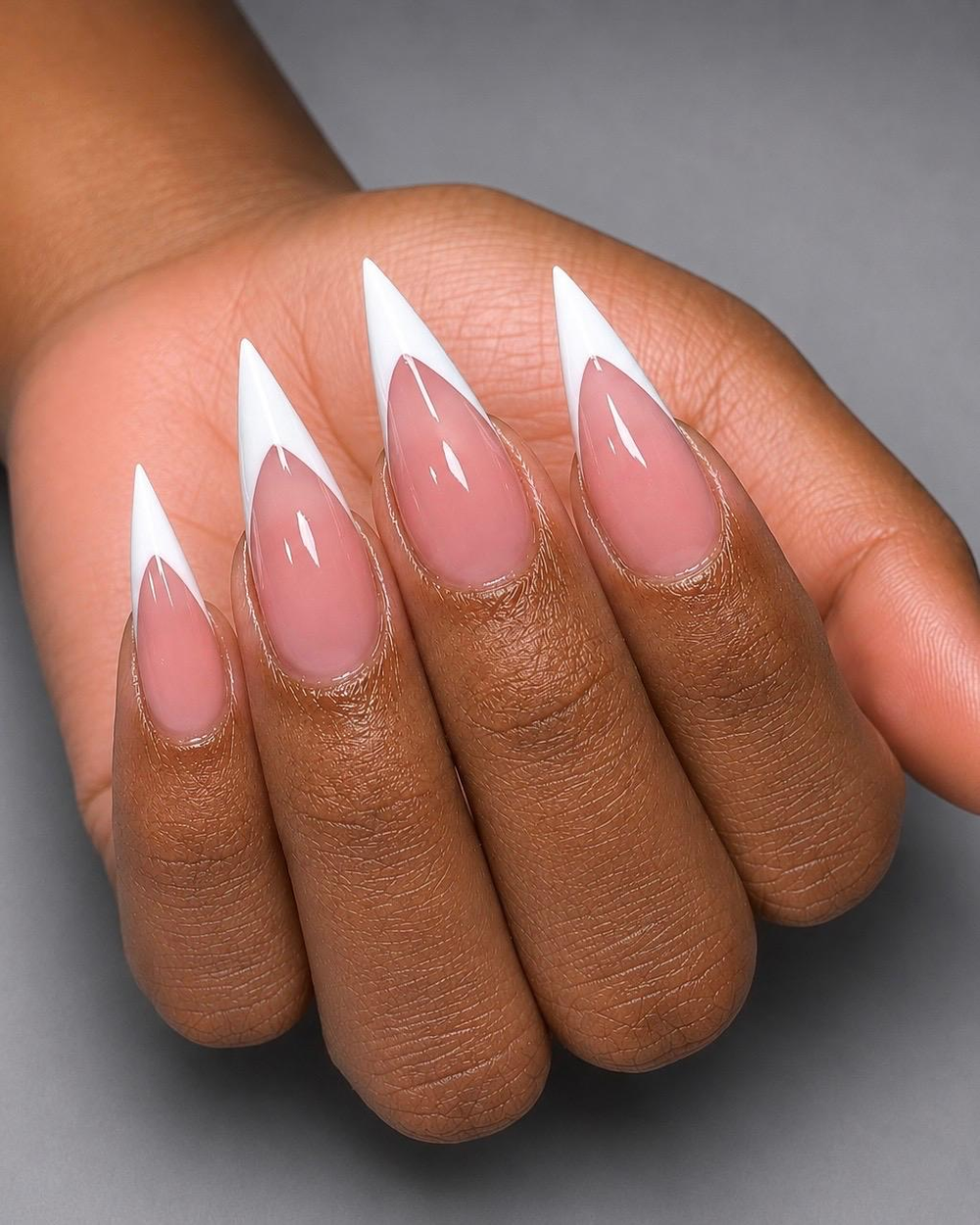 White french tips on long stiletto nails