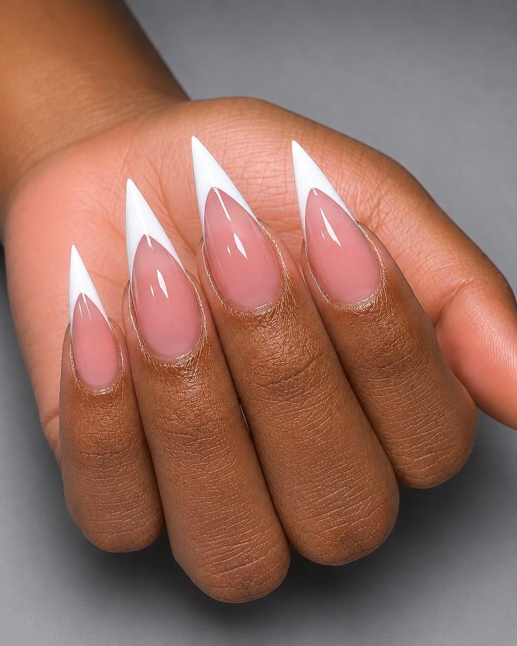 White french tips on long stiletto nails