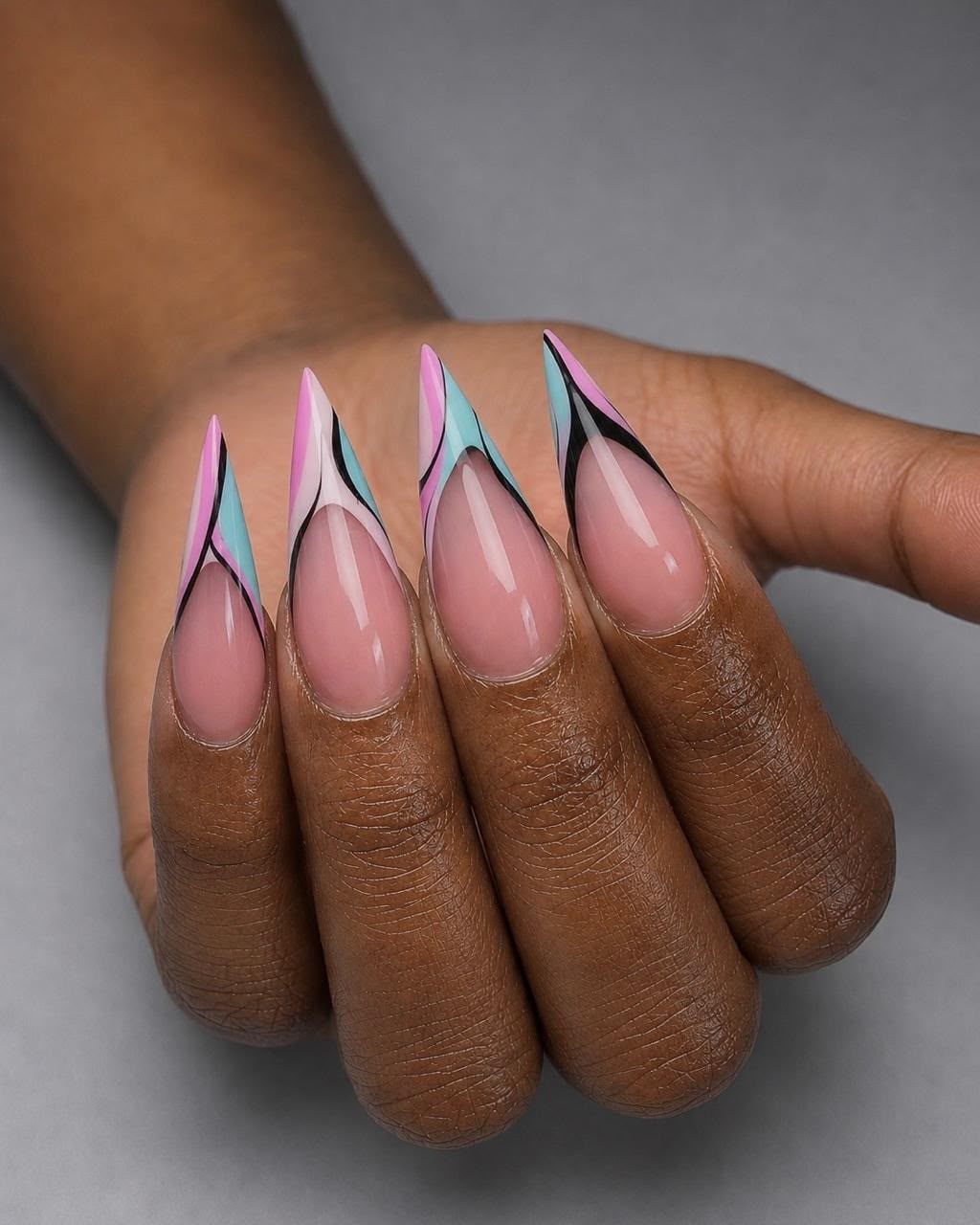 Pastel pink and blue swirl french long stiletto nails